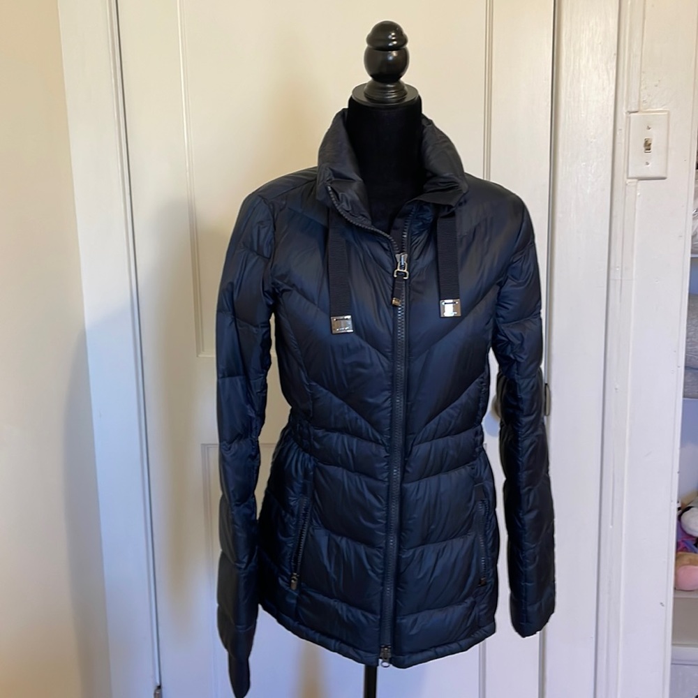Navy Athleta puffer jacket with fitted waist